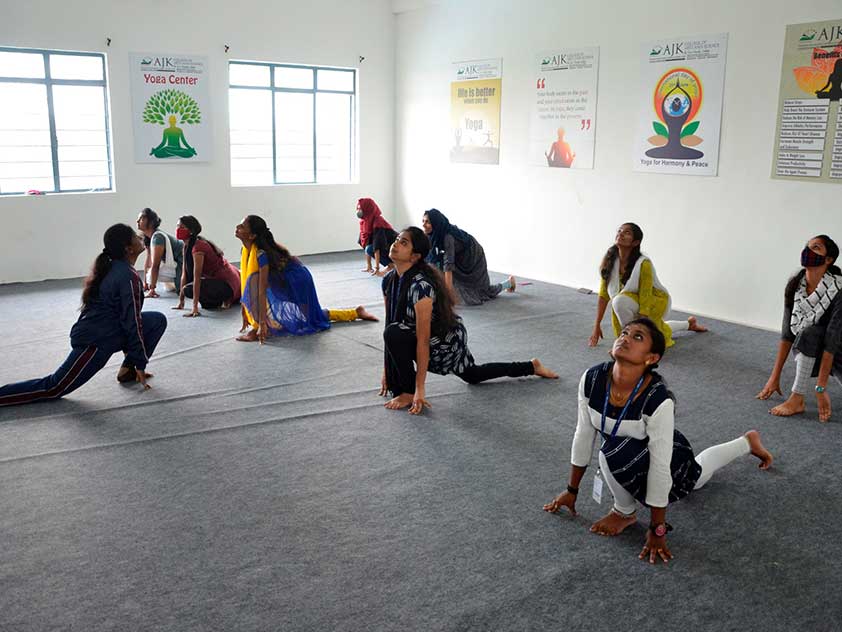 girls practicing yoga image two - ajkcas